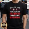 Happy Despite The Forecast T-Shirt featuring a spring Christmas design, perfect for festive and cheerful celebrations.