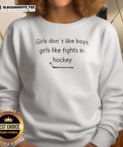 Happy girls wearing 'Girls Don't Like Boys, Girls Like Fights in Hockey' sweatshirt, showcasing team spirit and fun.