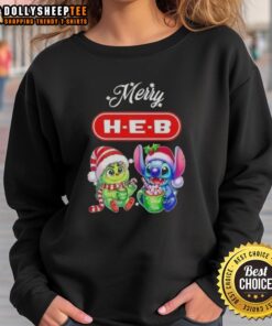 Happy Grinch and Stitch X H-E-B Merry Christmas sweatshirt featuring festive designs perfect for holiday celebrations.