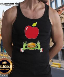Happy Grinch hands forming a heart with 'Love Applebee's' on a Merry Christmas tank top, perfect for festive cheer.