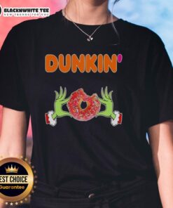 Happy Grinch hands holding a Dunkin' Donut, perfect for a Merry Christmas ladies' tee design.