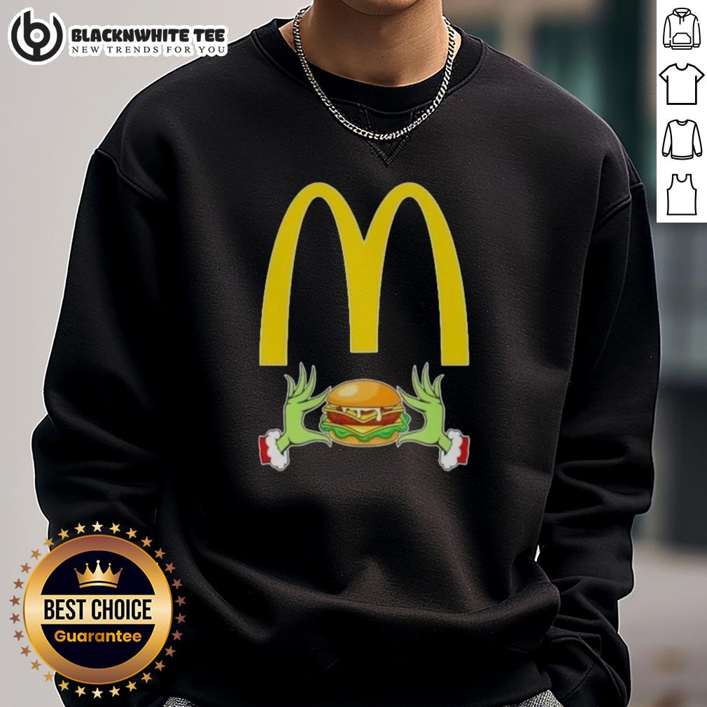 Happy Grinch Hands Love Mcdonald'S Merry Christmas Sweatshirt Happy Grinch hands holding a McDonald's cup on a Merry Christmas sweatshirt, perfect for festive holiday cheer.