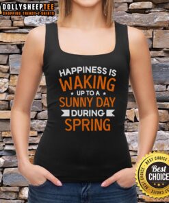 Happy woman in a spring tank top enjoying a sunny day, embodying happiness and joy in nature.