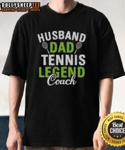 Happy husband and dad wearing a 'Tennis Legend Coach' T-shirt, showcasing pride in family and sports.