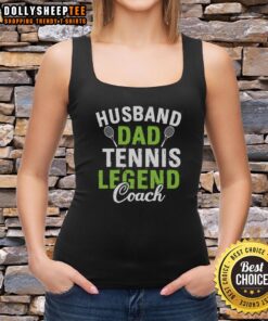 Happy husband and dad wearing a tennis legend coach tank top, smiling on the court, showcasing passion for the sport.