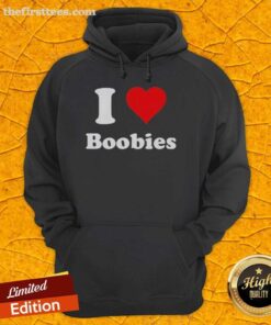 Person wearing a 'Happy I Love Boobs Hoodie' in a vibrant setting, showcasing a fun and playful style.