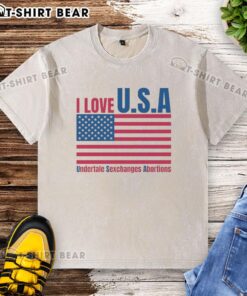 Happy I Love U.S.A. Undertale shirt featuring a bold design on a washed t-shirt, perfect for fans of unique graphic tees.