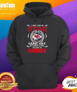 Alt Text: Person wearing a Kansas City Chiefs hoodie, showcasing team spirit in Utah on game day.