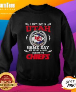 Alt Text: Cozy sweatshirt with Happy I May Live In Utah, But On Game Day My Heart Belongs To Kansas City Chiefs design.
