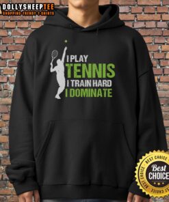 Happy player in 'I Play Tennis, I Train Hard, I Dominate' hoodie, showcasing passion for tennis on the court.