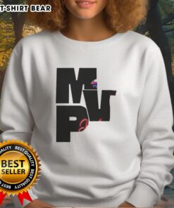 Happy Josh Allen wearing a Buffalo Bills sweatshirt with 'Be Good, Do Good, God Bless' MVP message, showcasing team spirit.