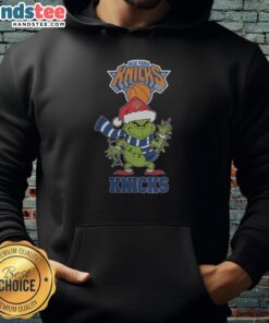 Happy New York Knicks Christmas Grinch Santa hat holiday 2025 hoodie worn by a fan in festive spirit.