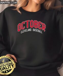 Alt Text: Happy October Cleveland Guardians Baseball Postseason 2025 Sweatshirt featuring team colors and logo.