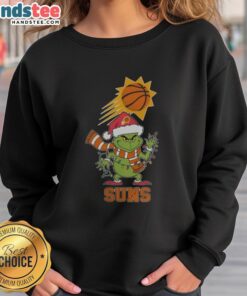 Happy Phoenix Suns sweatshirt featuring Grinch in a Santa hat for Christmas 2025 holiday cheer.