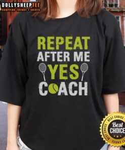 Happy tennis ladies in 'Repeat After Me Yes Coach' tee, enjoying a joyful moment on the court.