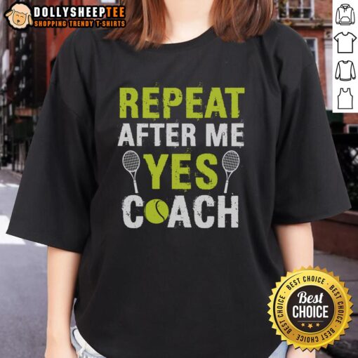 Happy tennis ladies in 'Repeat After Me Yes Coach' tee, enjoying a joyful moment on the court.