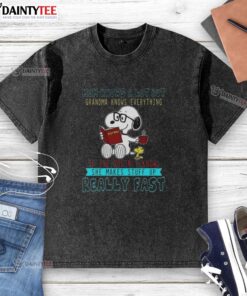 Happy Snoopy mom knows a lot but grandma knows everything graphic on a washed t-shirt, perfect for family bonding.