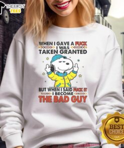 Happy Snoopy sweatshirt featuring the phrase 'When I Gave A F*ck I Was Taken.' Stylish and fun graphic design for fans.