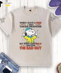 Happy Snoopy wearing a washed T-shirt, showcasing a playful attitude and carefree spirit, perfect for fans of Peanuts.