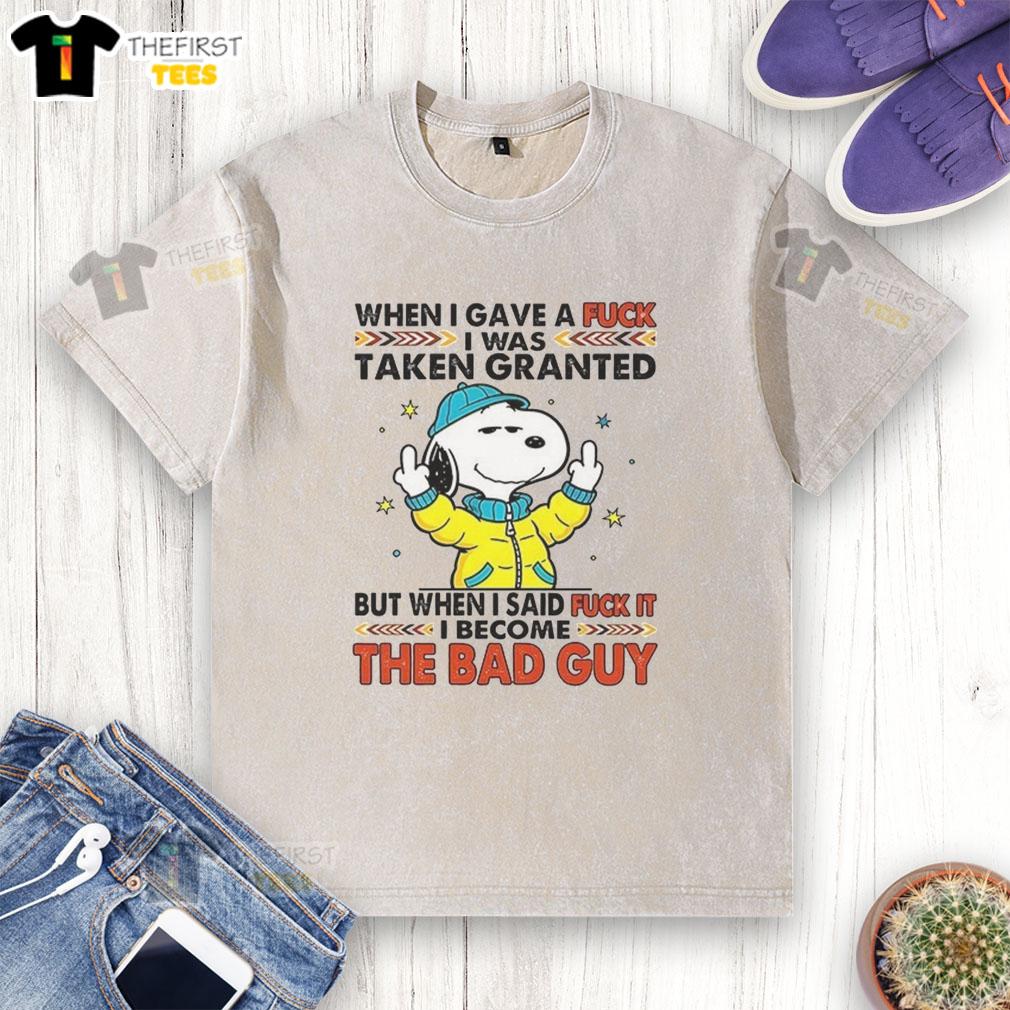 happy-snoopy-when-i-gave-a-fck-i-was-taken-granted-washed-t-shirt Happy Snoopy wearing a washed T-shirt, showcasing a playful attitude and carefree spirit, perfect for fans of Peanuts.