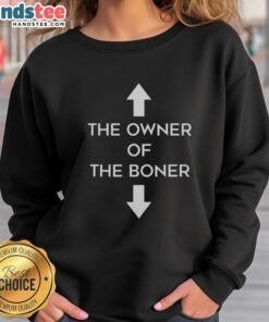 Happy owner wearing the Boner Sweatshirt, smiling in a cozy setting, showcasing trendy and humorous fashion style.