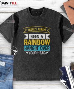 Colorful washed T-shirt with 'Happy, There's Always Been A Rainbow Hangin' Over Your Head' graphic design.