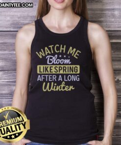 Happy woman wearing 'Watch Me Bloom Like Spring' tank top, symbolizing joy and renewal after a long winter.