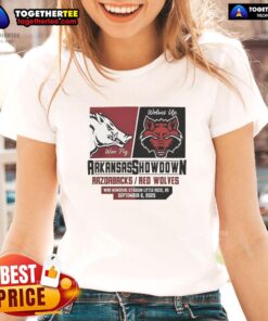 2025 showdown tee featuring Arkansas Razorbacks vs Arkansas State Red Wolves, perfect for ladies' sports fans.