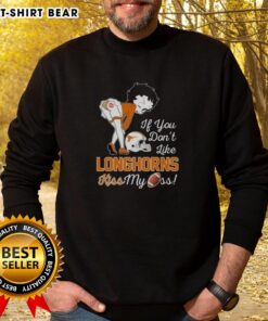 Hot Betty Boop sweatshirt featuring 'If You Don't Like Texas Longhorns, Kiss My Ass' slogan in bold graphics.