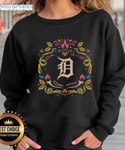 Hot Detroit Tigers Dia de los Muertos MLB celebration sweatshirt featuring vibrant designs and team logo.