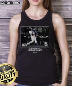 Eugenio Suarez in a Seattle Mariners tank top celebrates a key moment in the 2025 MLB NLCS postseason.