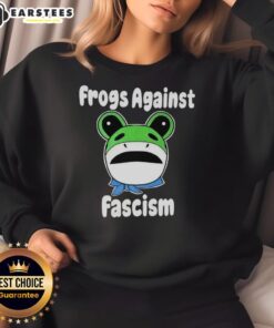 Alt Text: Hot Frogs Against Fascism meme sweatshirt featuring colorful frog graphics and bold anti-fascist text design.