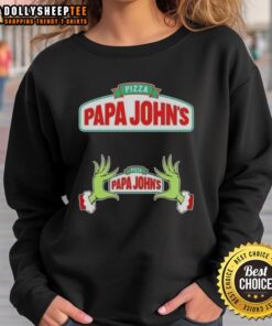 Hot Grinch hands holding a pizza in a Papa John's Merry Christmas sweatshirt, perfect for festive holiday apparel.