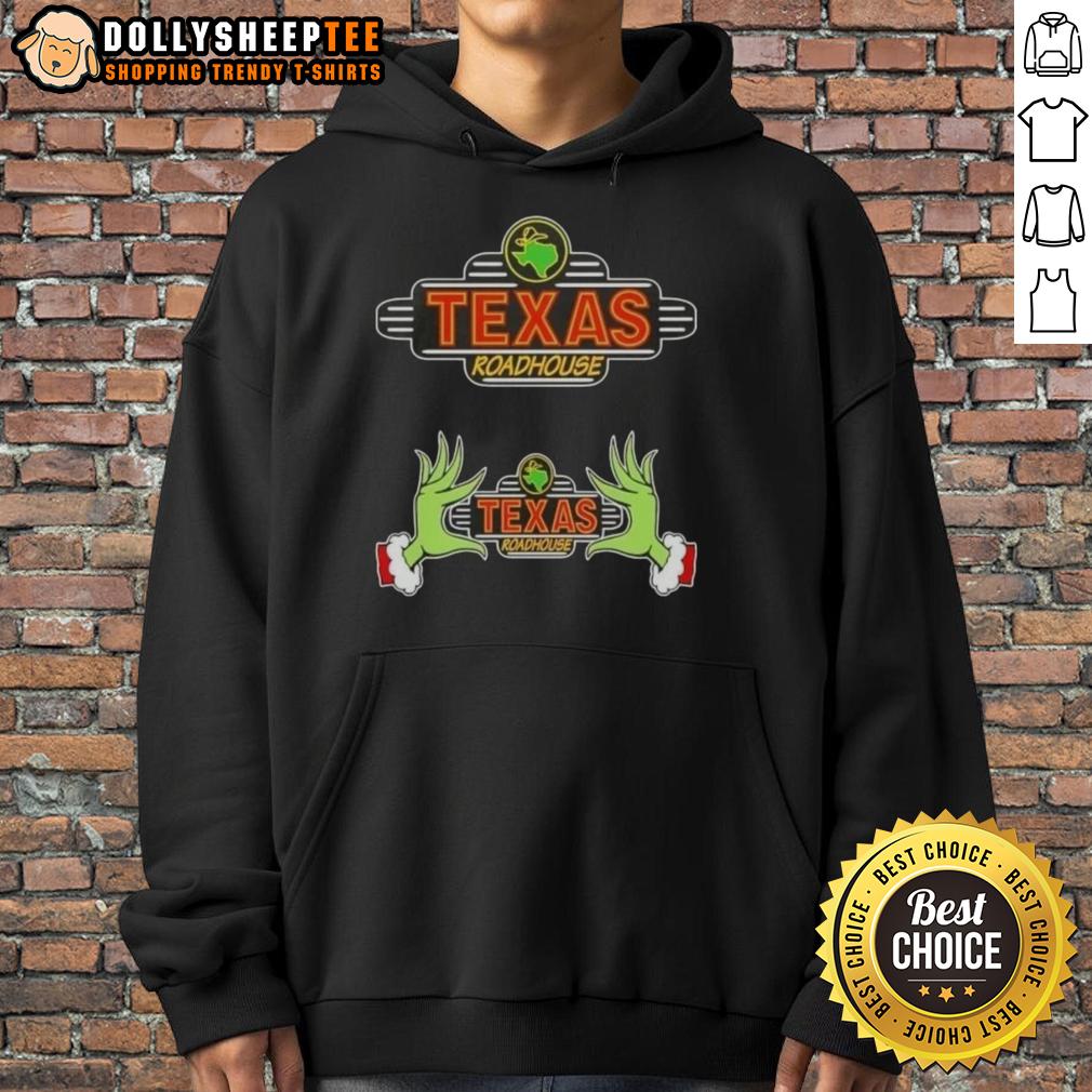Hot Grinch Hands Love Texas Roadhouse Merry Christmas Hoodie Alt Text: Hot Grinch hands holding a Texas Roadhouse hoodie, spreading Christmas cheer, perfect for holiday celebrations.