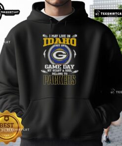 Alt Text: Fan wearing Green Bay Packers hoodie, showcasing pride with the phrase 'My heart belongs to Green Bay Packers'.
