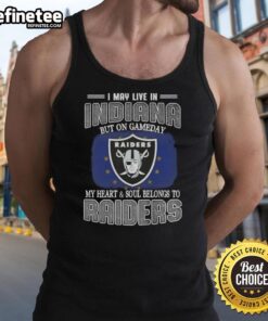 Alt Text: Woman wearing a Raiders tank top, showing team spirit on game day in Indiana, showcasing her love for the Raiders.