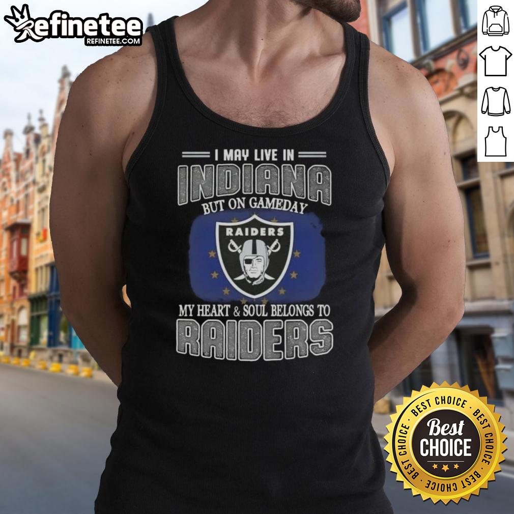 hot-i-may-live-in-indiana-but-on-gameday-my-heart-and-soul-belongs-to-raiders-tank-top Alt Text: Woman wearing a Raiders tank top, showing team spirit on game day in Indiana, showcasing her love for the Raiders.