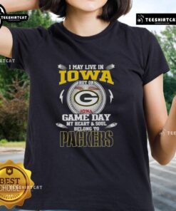 Alt Text: Green Bay Packers ladies tee with 'Hot I May Live In Iowa But On Game Day My Heart And Soul Belongs To Green Bay' design.