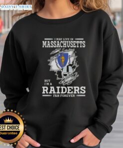 Cozy sweatshirt with 'Hot, I May Live in Massachusetts But I'm a Raiders Fan Forever' design, perfect for NFL fans.