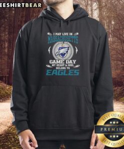 Alt Text: Person wearing a Philadelphia Eagles hoodie, showcasing team pride despite living in Massachusetts on game day.