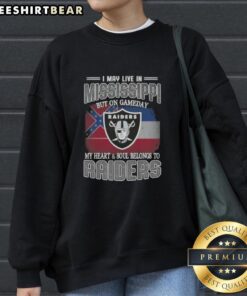Hot I May Live In Mississippi But On Gameday My Heart And Soul Belongs To Raiders Sweatshirt featuring team colors and logo.