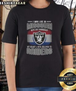Hot I May Live In Missouri But On Gameday My Heart and Soul Belongs to Raiders Ladies Tee displayed on a hanger.