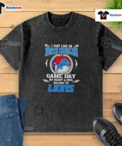Alt Text: Detroit Lions washed t-shirt with 'Hot, I may live in North Carolina, but on game day, my heart belongs to Detroit' design.