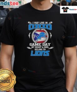 Alt Text: Hot I May Live In Ohio But On Game Day My Heart And Soul Belongs To Detroit Lions T-Shirt displayed on a hanger.