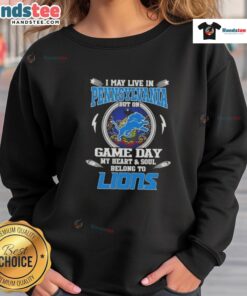 Alt Text: Cozy sweatshirt featuring Hot I May Live In Pennsylvania But On Game Day My Heart Belongs To Detroit Lions design.