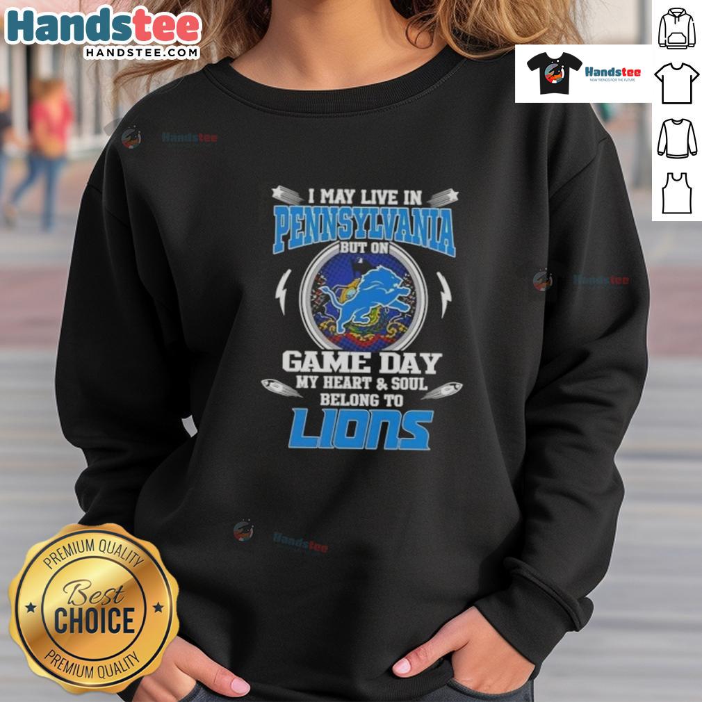 Hot I May Live In Pennsylvania But On Game Day My Heart And Soul Belongs To Detroit Lions Sweatshirt Alt Text: Cozy sweatshirt featuring Hot I May Live In Pennsylvania But On Game Day My Heart Belongs To Detroit Lions design.