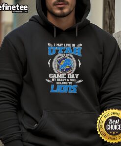 Alt Text: Fan in Detroit Lions hoodie shows team spirit despite living in Utah on game day, showcasing loyalty and pride.