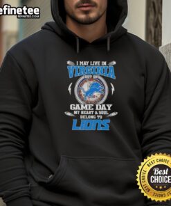 Person wearing a Detroit Lions hoodie, showcasing team pride on game day, despite living in Virginia.