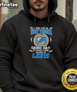 Alt Text: Person wearing a Detroit Lions hoodie, showing pride for the team despite living in West Virginia on game day.