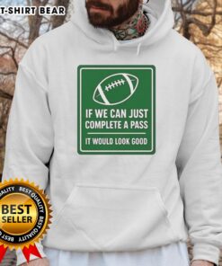 Football hoodie with signboard text 'Hot If We Can Complete A Pass' displayed in a stylish design.